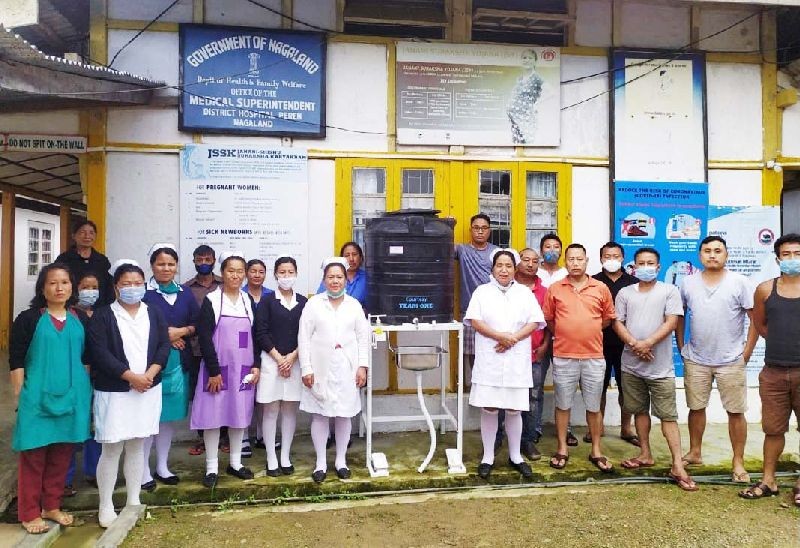 TEAM ONE Peren donated water storage attached with basin and stand to COVID hospital CHC Jalukie and District Hospital, Peren on June 14. (DIPR Photo)